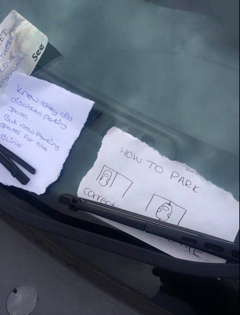 Car parked across two spaces receives scathing response from passers-by Car parked across two spaces receives scathing response from passers-by