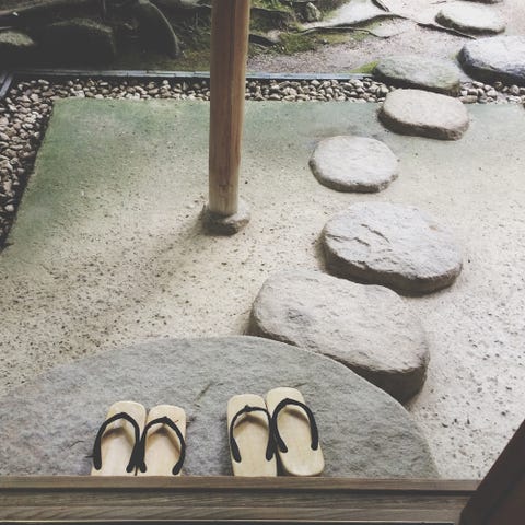 Footwear, Rock, Shoe, Architecture, Table, Metal, Beige, Wood, Floor, Flooring, 