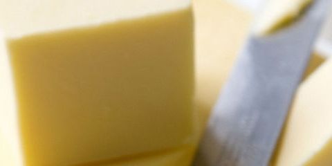 Cheese, Gruyère cheese, Dairy, Parmigiano-reggiano, Cheddar cheese, Montasio, Wax, Butter, Food, Cocoa butter, 