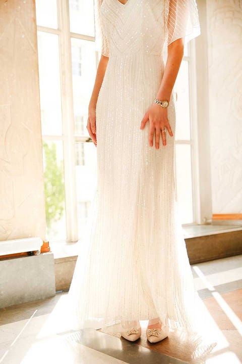 Clothing, Shoulder, Shoe, Dress, Textile, Joint, White, Standing, Bridal clothing, Gown, Clothing, Shoulder, Shoe, Dress, Textile, Joint, White, Standing, Bridal clothing, Gown,
