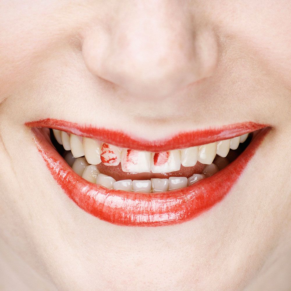 A makeup artist's number one tip to avoid getting lipstick on your teeth