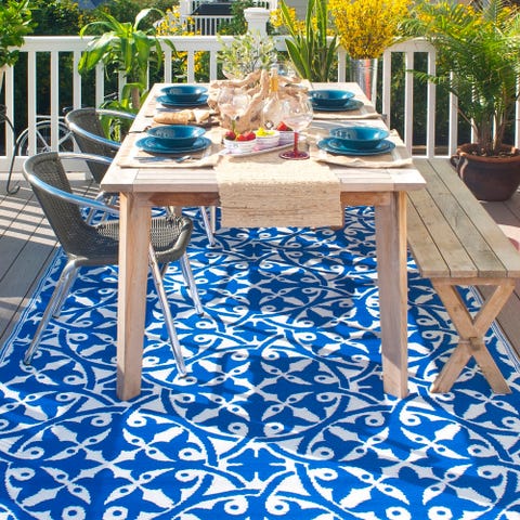 Furniture, Table, Blue, Outdoor furniture, Outdoor table, Coffee table, Tablecloth, Kitchen & dining room table, Turquoise, Patio, 