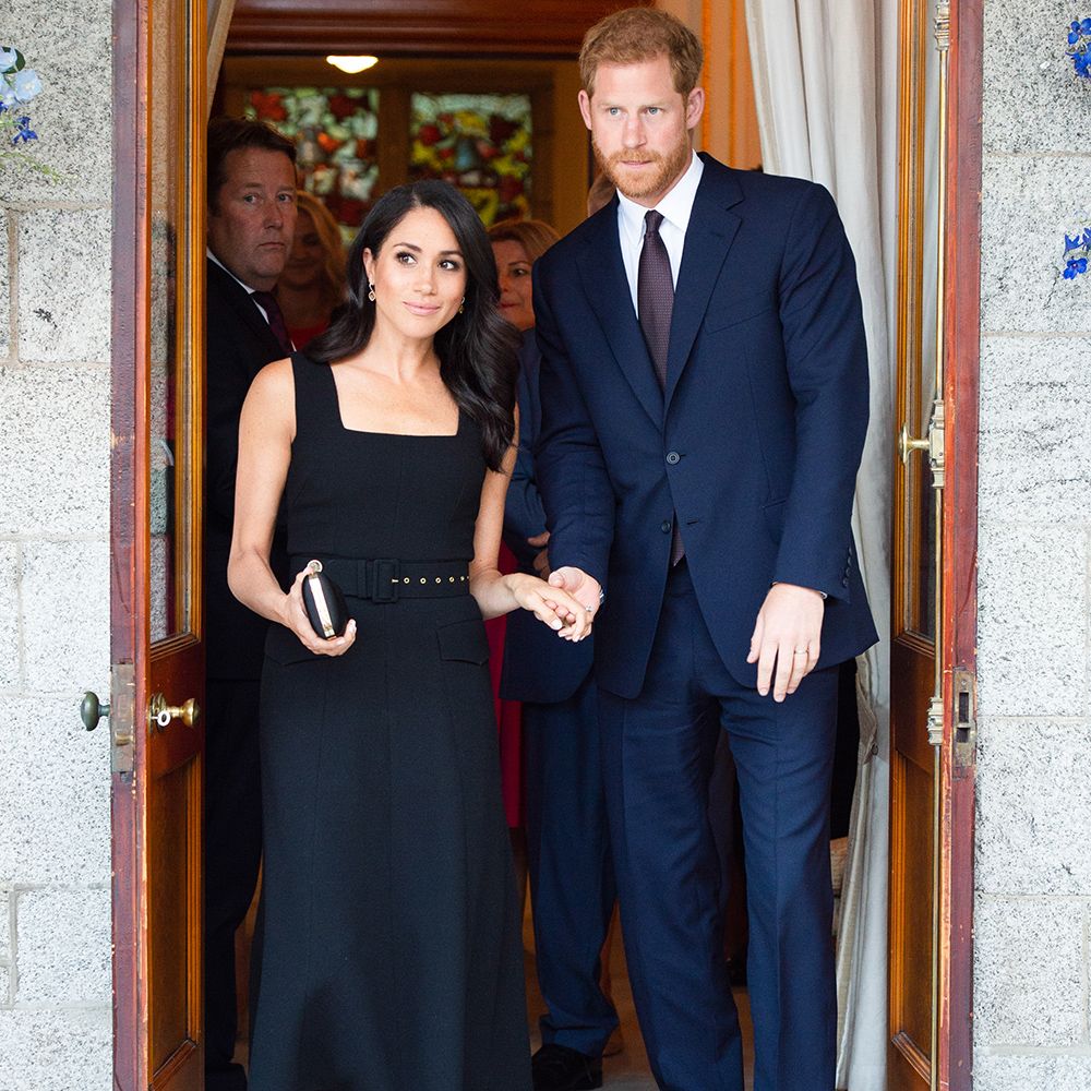 black dress navy suit couple