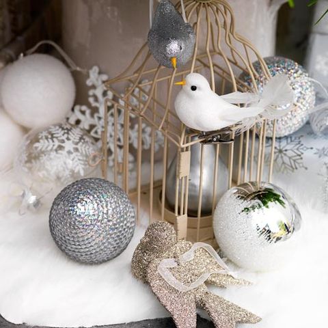 Bird, Interior design, Beak, Sphere, Ornament, Silver, Christmas ornament, Collection, Porcelain, Kitchen utensil, 
