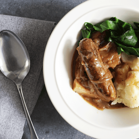 slow cooker sausage casserole with onion gravy