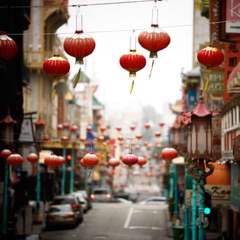 Red, Public space, Lantern, Lighting accessory, Street, World, Chinese new year, Light fixture, Human settlement, Holiday, 