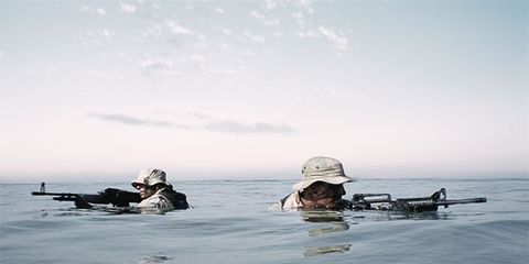 Water, Helmet, Goggles, Marines, Ocean, Machine gun, Military person, Diving mask, 