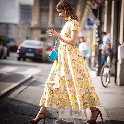 Clothing, Road, Dress, Street, Style, Street fashion, Road surface, Day dress, One-piece garment, Sandal, 