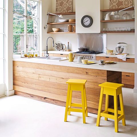 Wood, Room, Yellow, Interior design, Furniture, Wall, Home, Floor, Dishware, Picture frame, 