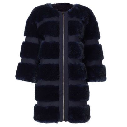 Sleeve, Textile, Outerwear, Black, Woolen, Wool, Fur, Natural material, Sweater, Fur clothing, 