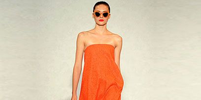 Human leg, Shoulder, Dress, Joint, One-piece garment, Style, Fashion model, Orange, Waist, Fashion, 