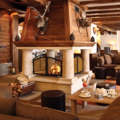 Wood, Room, Interior design, Living room, Property, Hearth, Home, Ceiling, Wall, Table, 