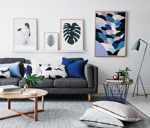 Living room, Room, Blue, Furniture, Interior design, Wall, Table, Leaf, Couch, Coffee table, 