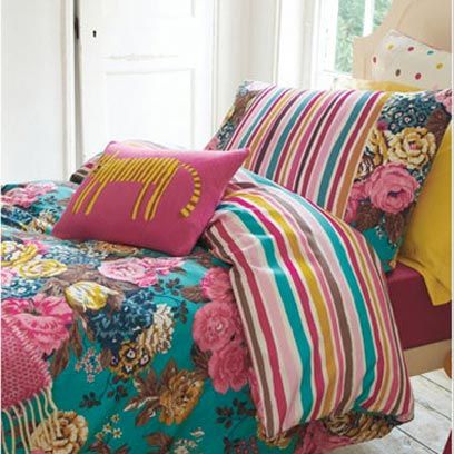 Textile, Interior design, Pink, Pattern, Linens, Magenta, Cushion, Door, Teal, Orange, 