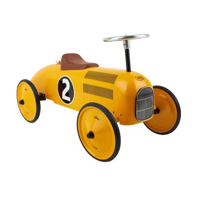 Yellow, Automotive design, Orange, Auto part, Toy vehicle, Tread, Automotive wheel system, Rolling, Toy, Circle, 