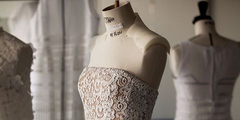 Textile, Dress, Mannequin, Fashion, Gown, Wedding dress, One-piece garment, Embellishment, Ivory, Fashion design, 