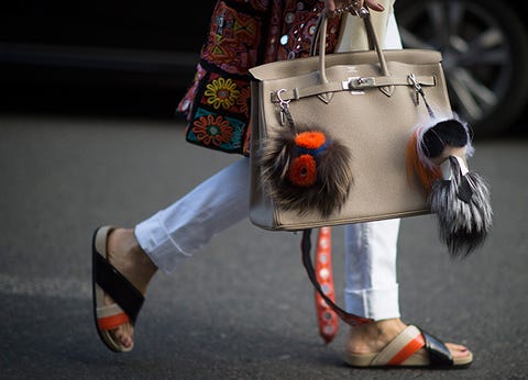 The It Bag S New Best Friend Charms To Now Image