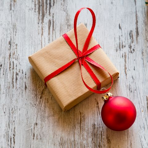 Red, Christmas ornament, Gift wrapping, Ribbon, Present, Wood, Cinnamon stick, Ornament, Christmas decoration, Christmas, 