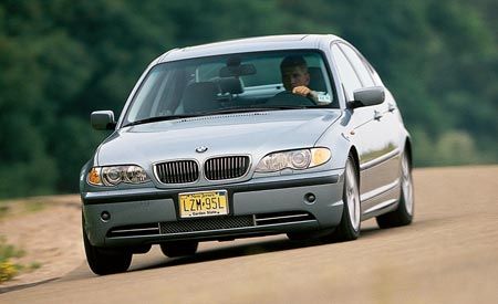 2002 Bmw 330i Comparison Tests Comparisons Car And Driver 2002 Bmw 330i