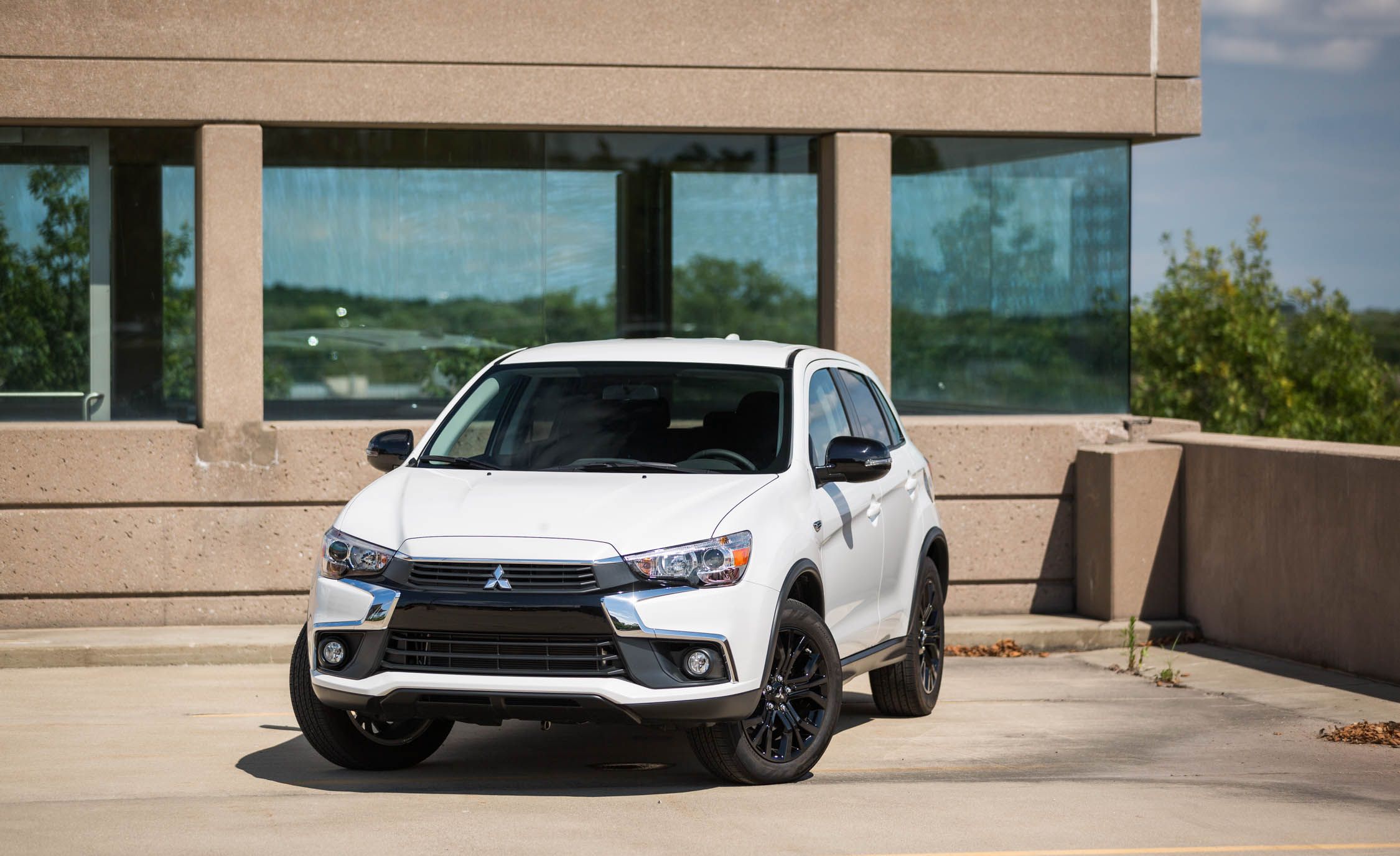 Mitsubishi Outlander Sport Reviews | Mitsubishi Outlander Sport Price, Photos, and Specs | Car and Driver