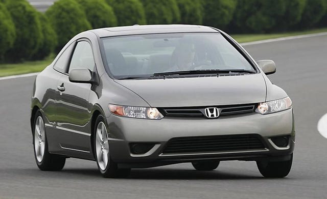 2010 Honda Civic / Civic Hybrid DX 2dr Man Features and Specs