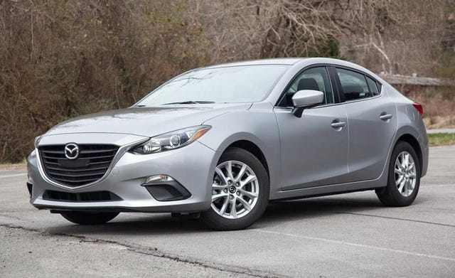 2014 Mazda 3 i SV 4dr Sdn Man Features and Specs