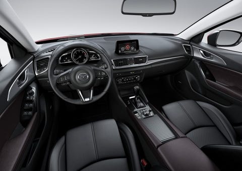 Mazda Reveals Updated 3 Compact Sedan And Hatch News Car Driver Interior Black Brown Head Up Display