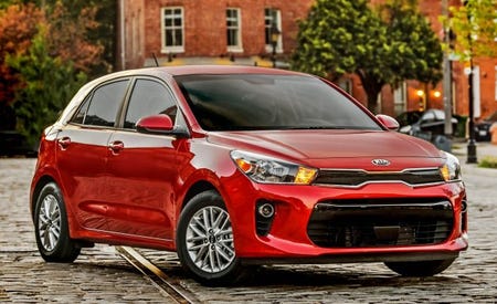Kia Rio Reviews Kia Rio Price Photos And Specs Car And Driver