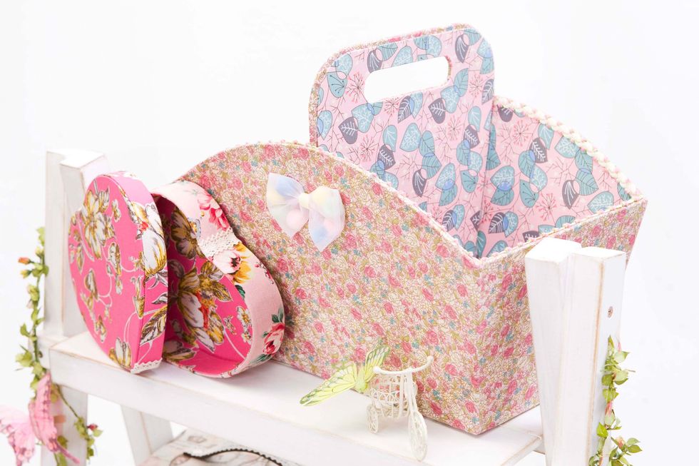 Textile, Pink, Pattern, Cushion, Throw pillow, Peach, Creative arts, Pattern, Pillow, Motif, 