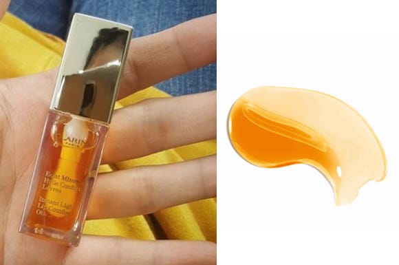 Finger, Yellow, Amber, Orange, Nail, Thumb, Material property, Peach, Cosmetics, Kitchen utensil, 