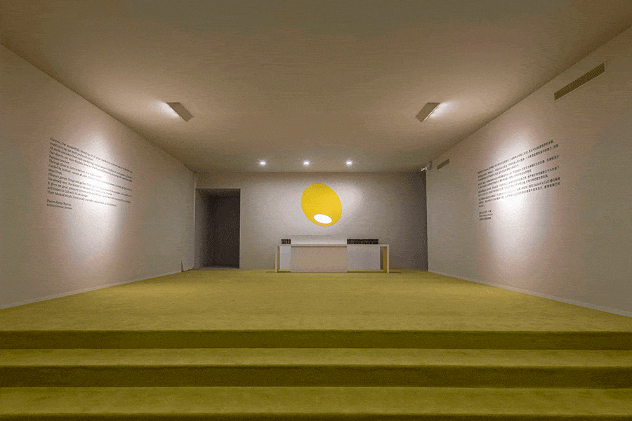 Ceiling, Yellow, Lighting, Room, Floor, Interior design, Building, Architecture, Flooring, Hall, 