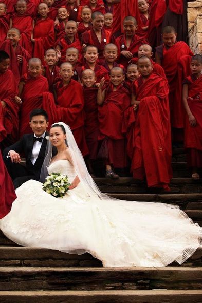 Photograph, Red, Bridal clothing, Petal, Formal wear, Tradition, Bride, Dress, Wedding dress, Suit, 