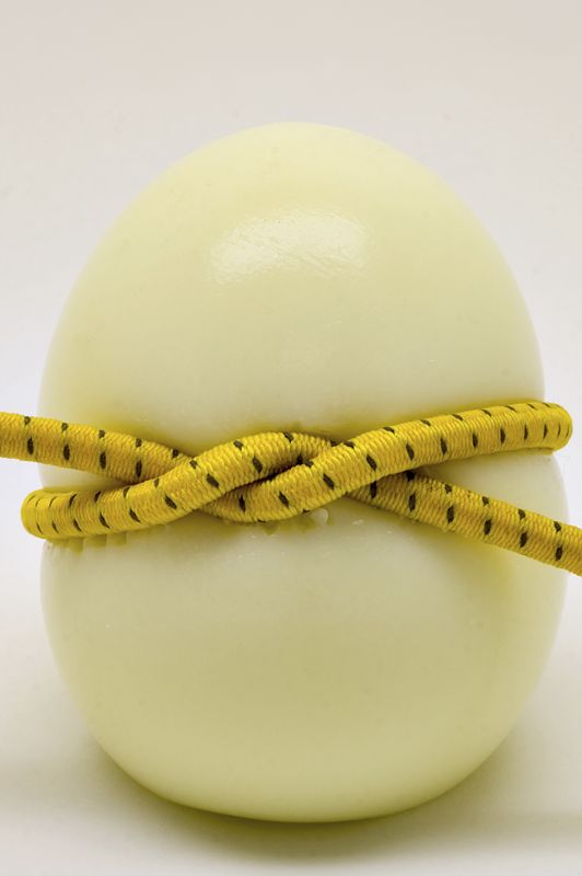 Yellow, Natural material, Beige, Ball, Still life photography, Dishware, Kitchen utensil, Craft, Animal product, 