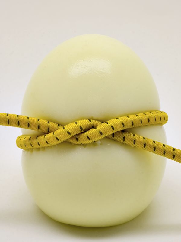 Yellow, Natural material, Beige, Ball, Still life photography, Dishware, Kitchen utensil, Craft, Animal product, 