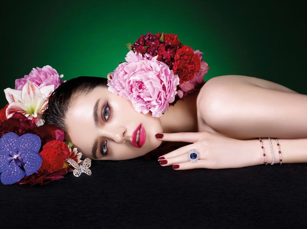 Pink, Headpiece, Beauty, Flower, Lip, Photo shoot, Hair accessory, Hand, Petal, Plant, 