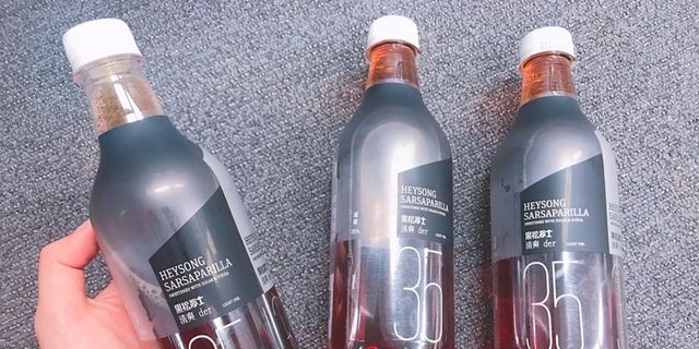 Liquid, Product, Bottle, Fluid, Red, Glass bottle, Bottle cap, Drink, Drinkware, Logo, 