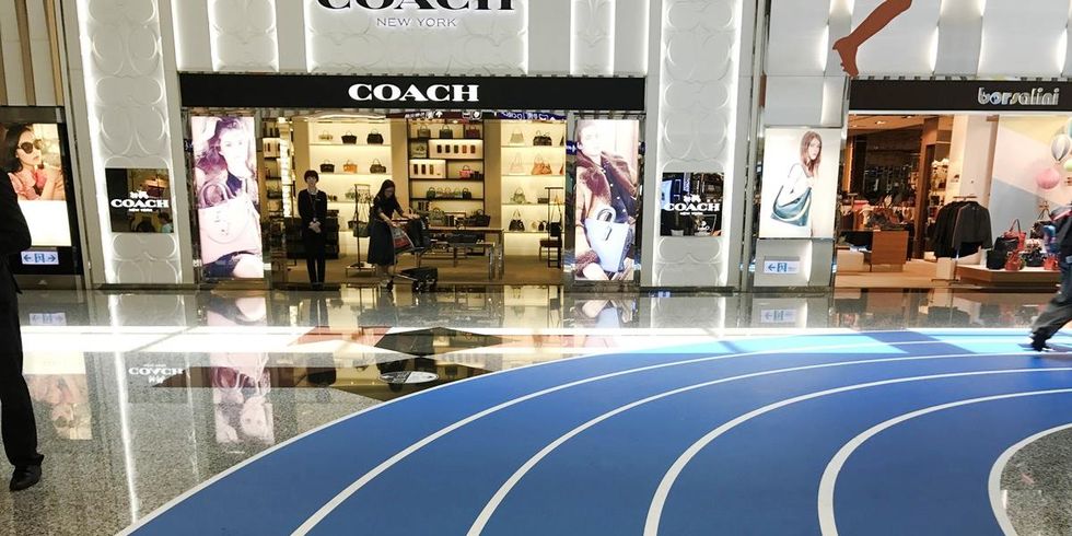 Floor, Infrastructure, Line, Flooring, Shopping mall, Advertising, Building, World, Signage, Architecture, 
