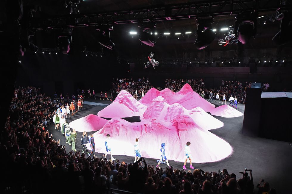 Pink, Stage, Performance, Entertainment, Sport venue, Performance art, Performing arts, Event, Lighting, Arena, 