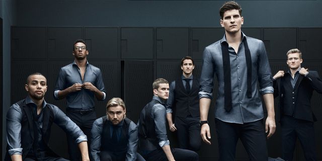 Social group, Standing, Sitting, Team, Denim, Flash photography, Collaboration, Suit trousers, Pocket, Top, 
