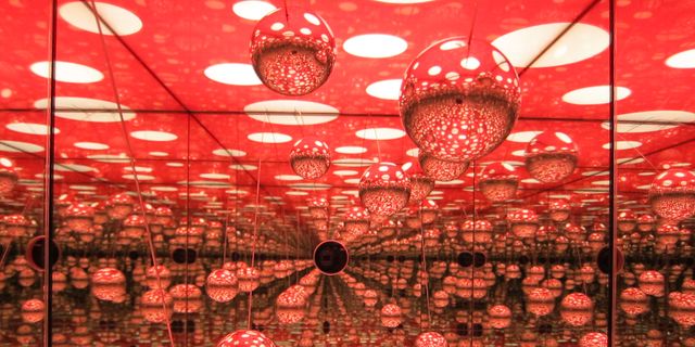 Red, Decoration, Ceiling, Light fixture, Lighting accessory, Ceiling fixture, Sphere, Circle, Hall, 