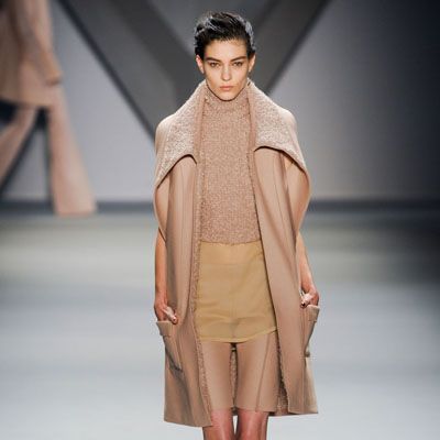 Clothing, Brown, Fashion show, Shoulder, Joint, Outerwear, Runway, Style, Fashion model, Knee, 
