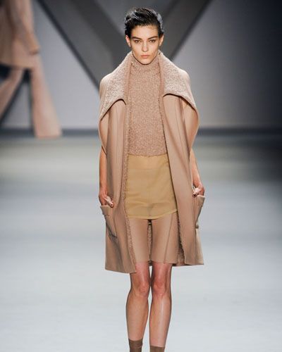 Clothing, Brown, Fashion show, Shoulder, Joint, Outerwear, Runway, Style, Fashion model, Knee, 