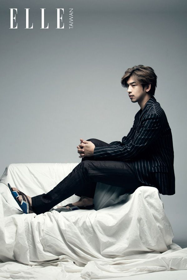 Human body, Shoe, Sitting, Knee, Model, Photo shoot, Fashion model, Ankle, Stock photography, Suit trousers, 