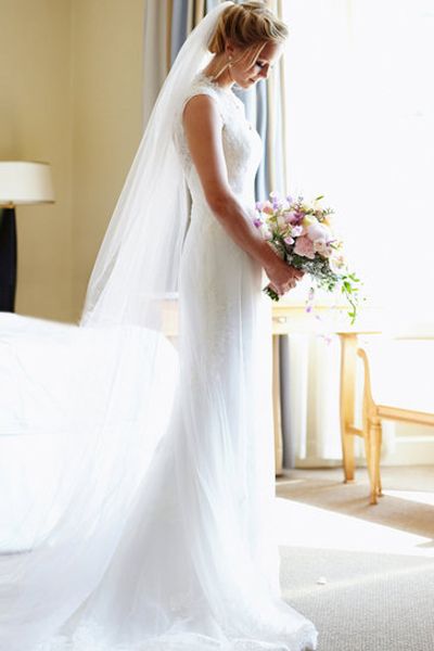 Clothing, Bridal clothing, Shoulder, Dress, Textile, Wedding dress, Photograph, Joint, Petal, Standing, 