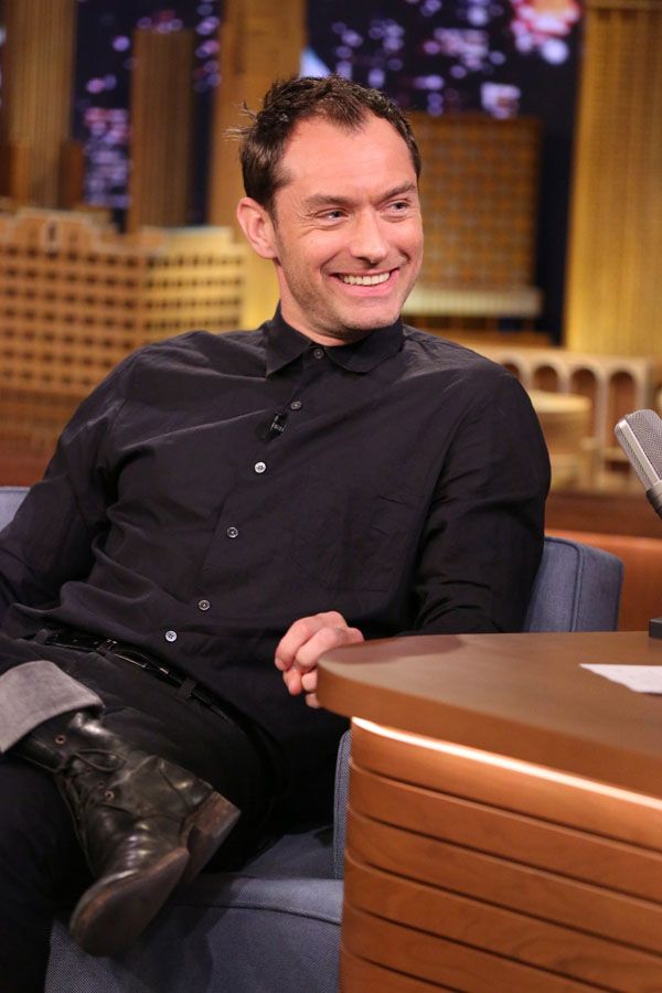 Facial expression, Dress shirt, Sitting, Laugh, Leather, Pleased, 