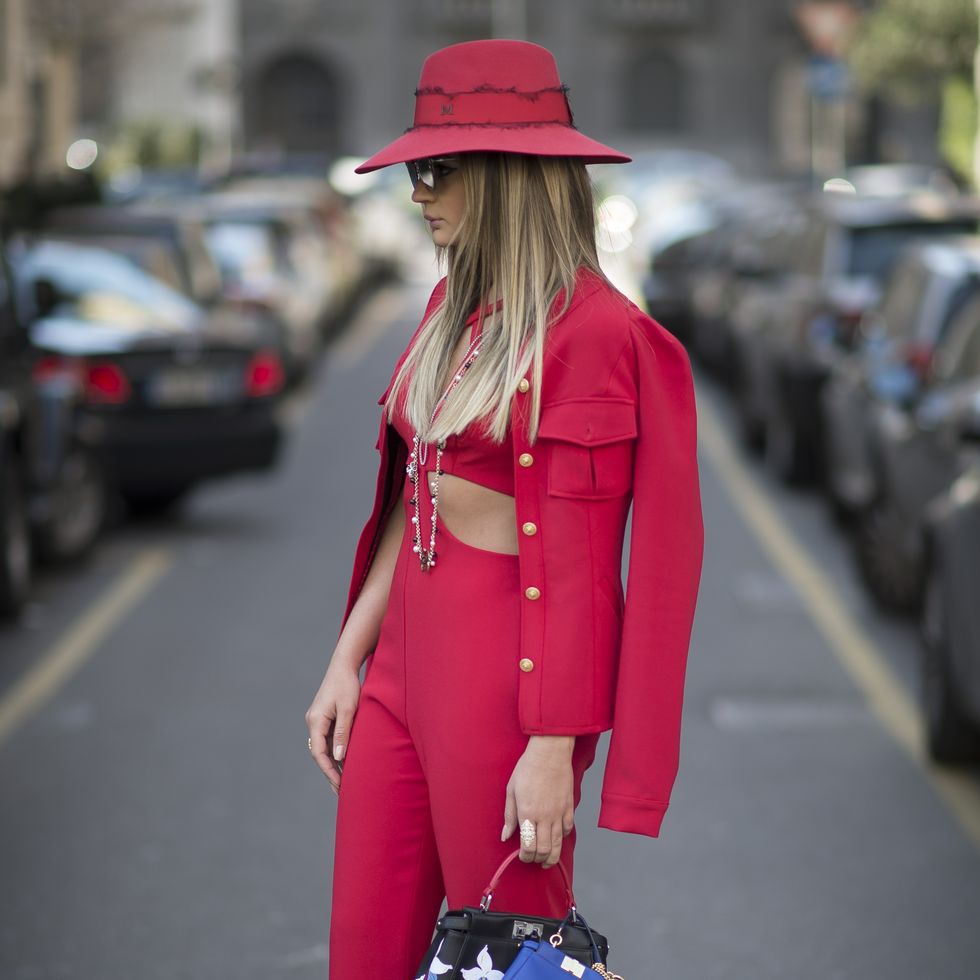Clothing, Hat, Bag, Textile, Red, Outerwear, Fashion accessory, Street fashion, Style, Pattern, 
