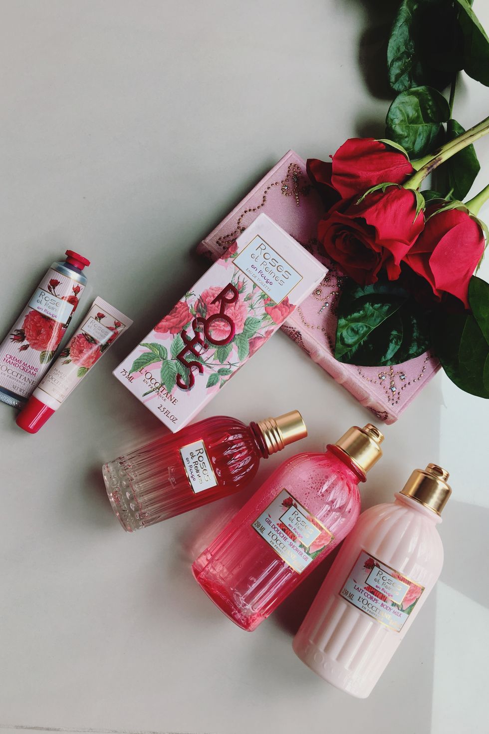 Red, Pink, Beauty, Material property, Rose, Cosmetics, Flower, Plant, Present, Hair care, 