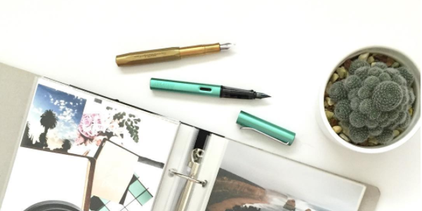 Stationery, Writing implement, Teal, Material property, Office supplies, Paper product, Collection, Fedora, Cosmetics, Paper, 