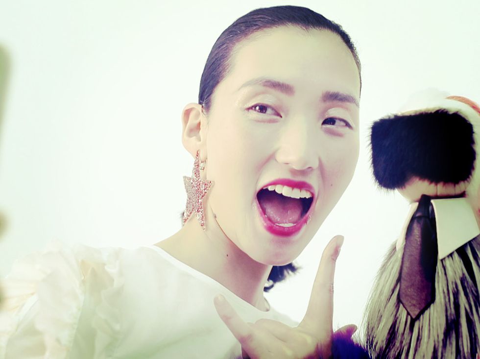 Ear, Happy, Tooth, Eyelash, Style, Jaw, Jewellery, Gesture, Tongue, Glove, 