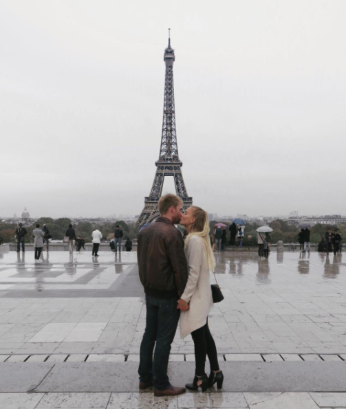 Human, Tourism, Trousers, Standing, Photograph, Outerwear, Coat, Tower, Landmark, Vacation, 